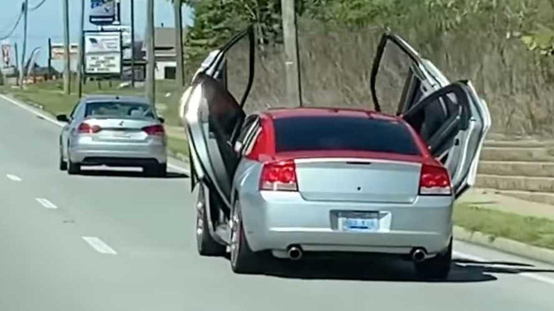 Charger Cruising With Four Scissor Doors Open Is The Epitome Of Weird 1 Charger Cruising With Four Scissor Doors Open Is The Epitome Of Weird