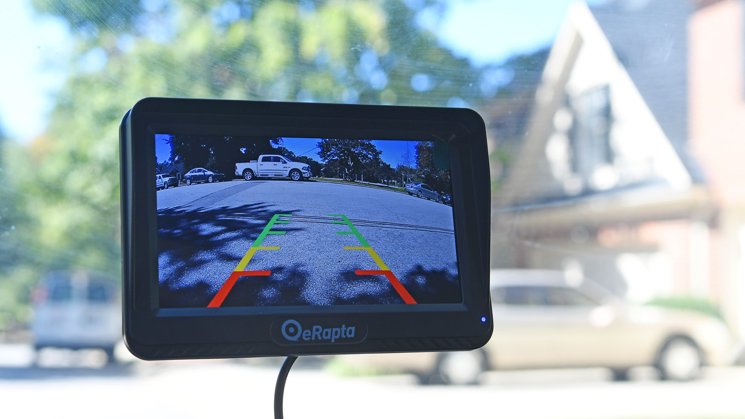 The eRapta ERT01 Car Rearview Camera installed in a testing vehicle and turned on to display the camera screen.