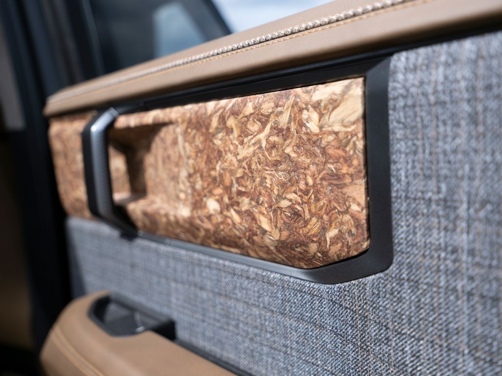 A close-up shot of the wood door trim on the Scout Motors Traveler Mountainside concept
