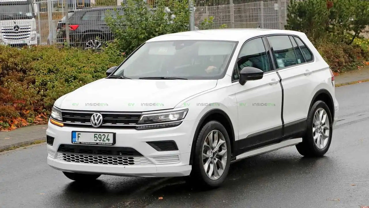 Škoda's First MEB-Based Test Mule Spotted In VW Tiguan Skin Škoda MEB-based EV test mule
