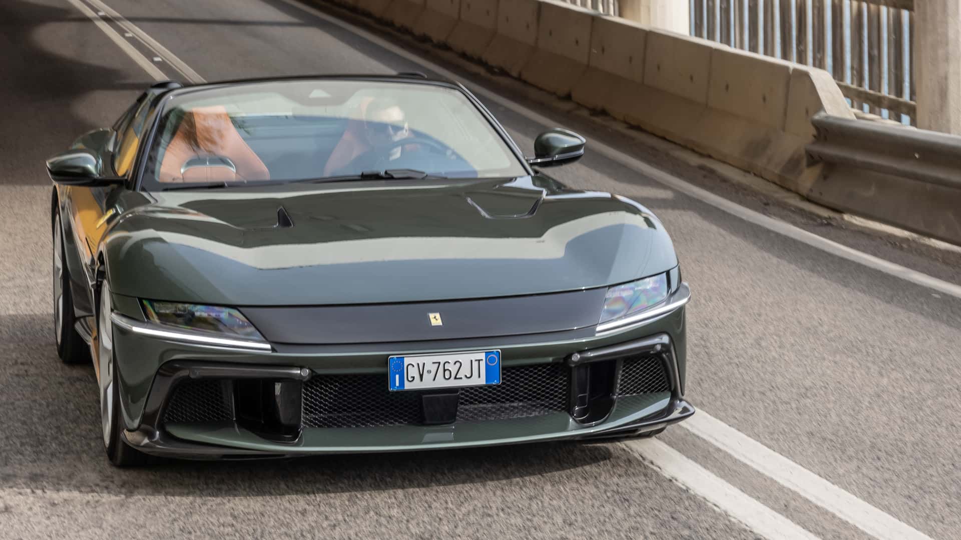 https://cdn.motor1.com/images/mgl/0eO44m/s1/2025-ferrari-12cilindri-spider-first-drive-review.jpg