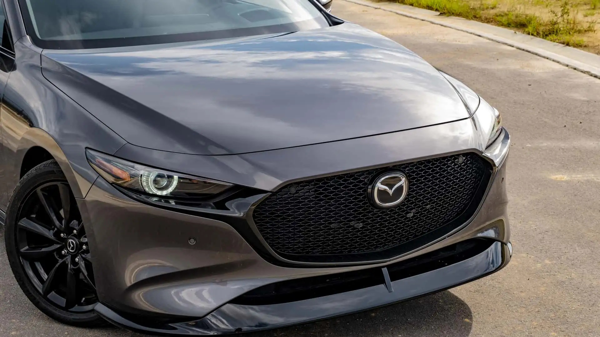 https://cdn.motor1.com/images/mgl/0eWNL2/s1/2024-mazda3-turbo-review.webp