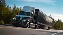 Freightliner eCascadia production version front three-quarter view driving