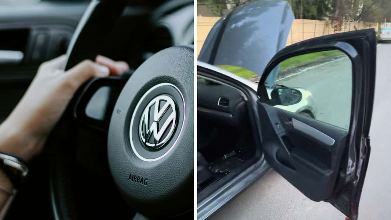 Man installs new doors for his Volkswagen Golf.jpg