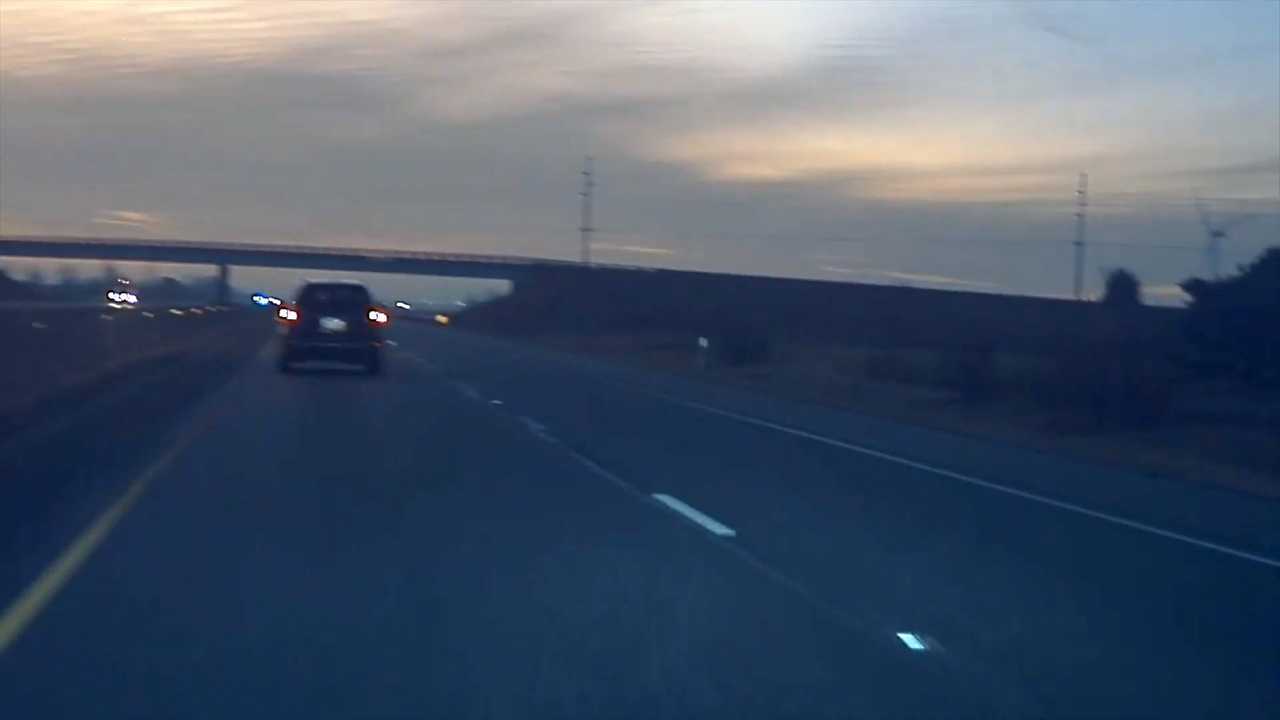 Hit By A Car And A Bottle: The Weirdest Hit And Run Ever Recorded By TeslaCam