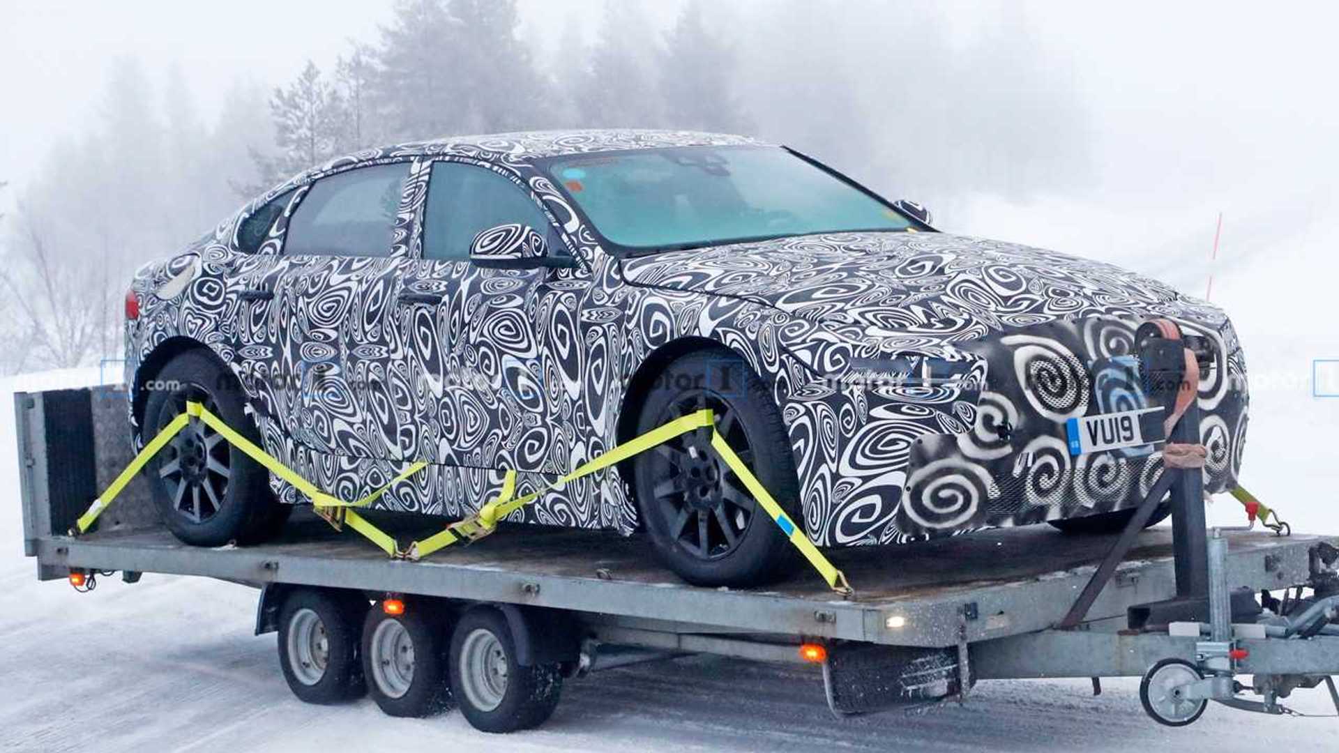 https://cdn.motor1.com/images/mgl/0lgY9/s1/jaguar-xj-ev-spy-shots.jpg jaguar-xj-ev-spy-shots