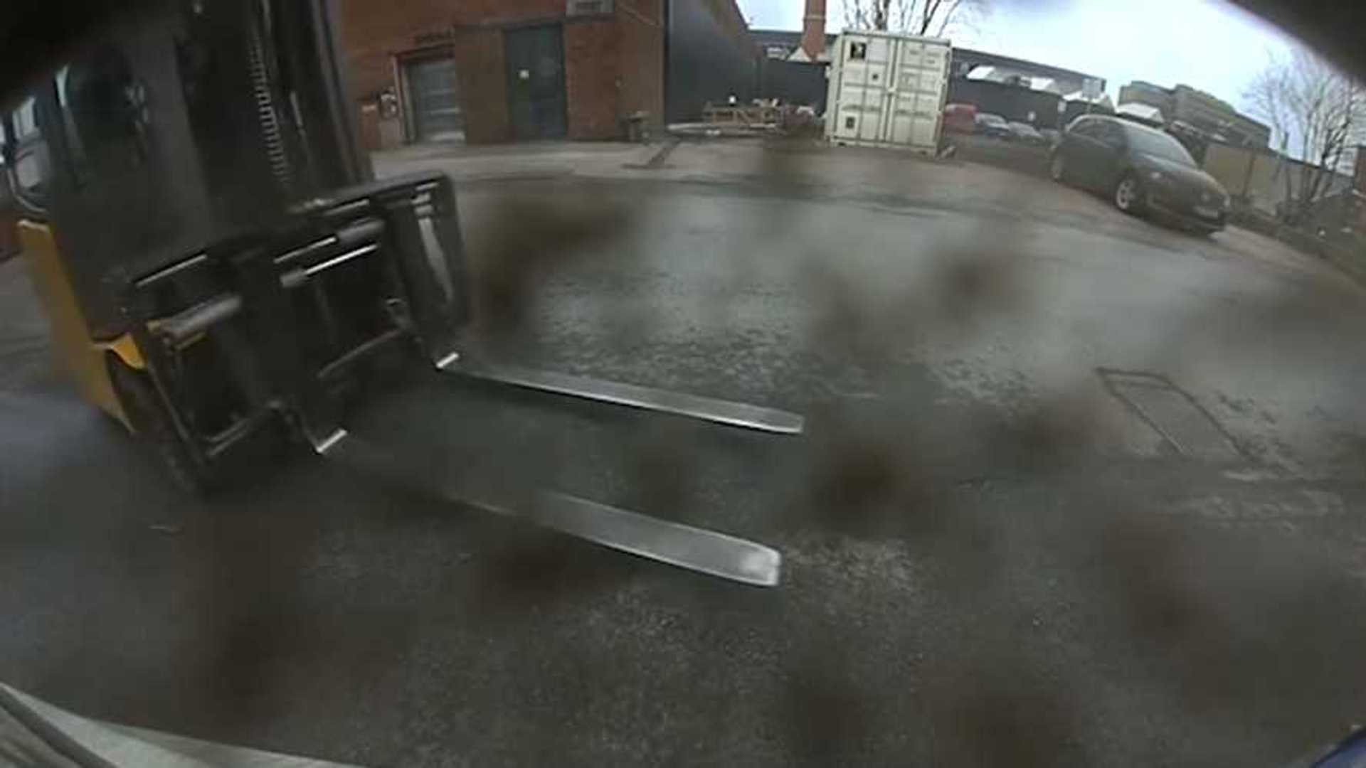 Watch CellphoneUsing ForkLift Driver Smash A Tesla Model S And Flee