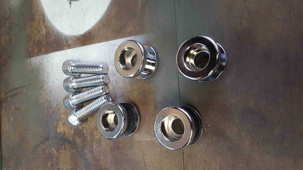 Four little knobs and their bolts. An easy job.
