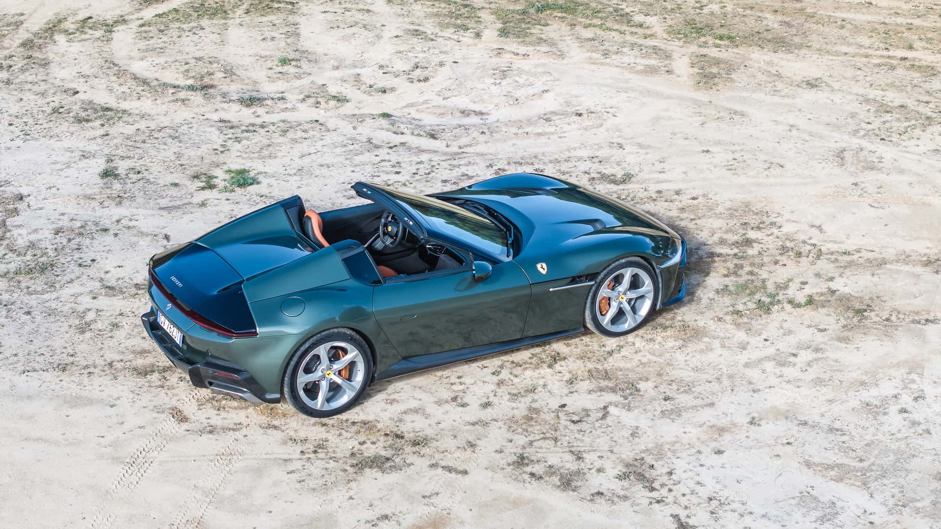 https://cdn.motor1.com/images/mgl/1Z1zzL/s1/2025-ferrari-12cilindri-spider-first-drive-review.jpg