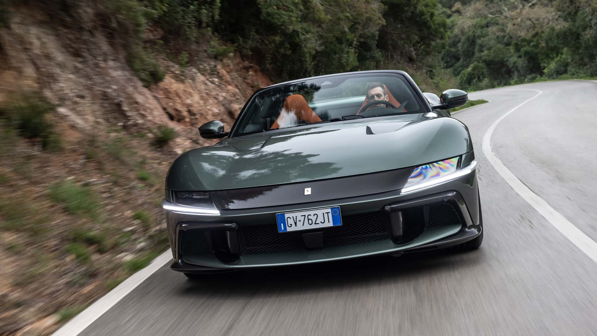 https://cdn.motor1.com/images/mgl/1Z1zzM/s1/2025-ferrari-12cilindri-spider-first-drive-review.jpg