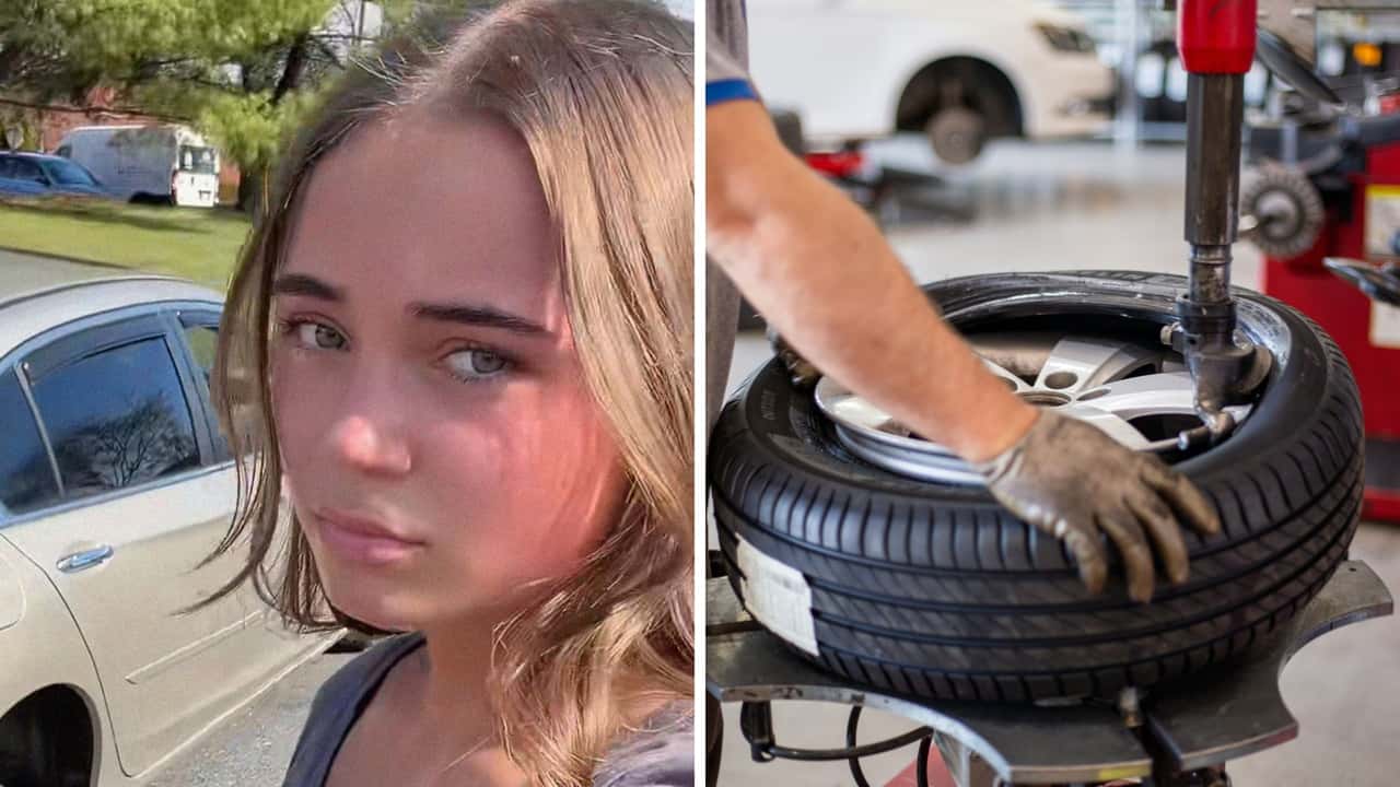 Woman gets her tires rotated (1)