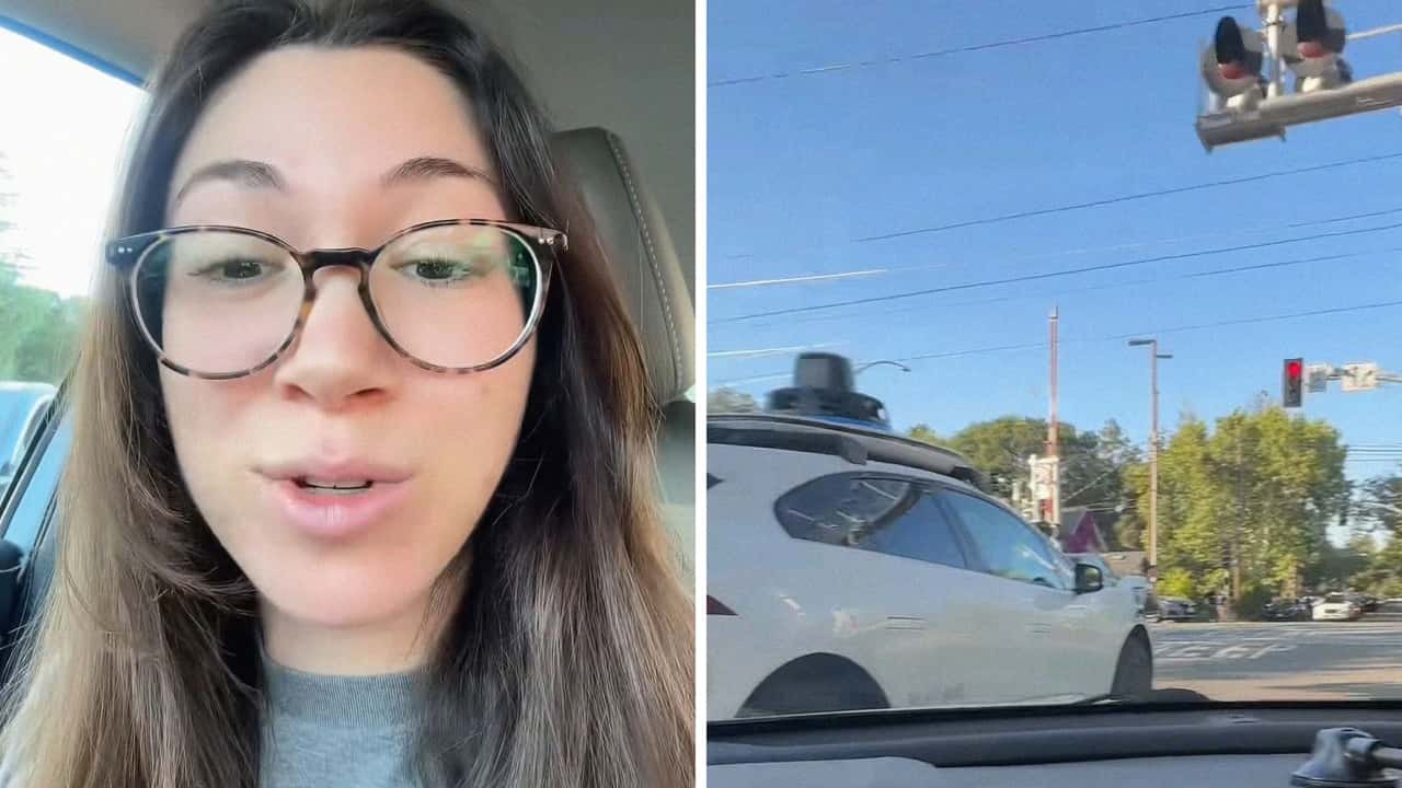 Woman Gets Behind 2 Waymos At A Stoplight