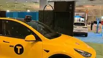 Gravity Tesla Model Y NYC yellow taxi and new TFC-C1 urban fast-charger at NYIAS