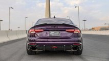 Violet Audi RS5 Sportback with bronze wheels, yoke steering wheel