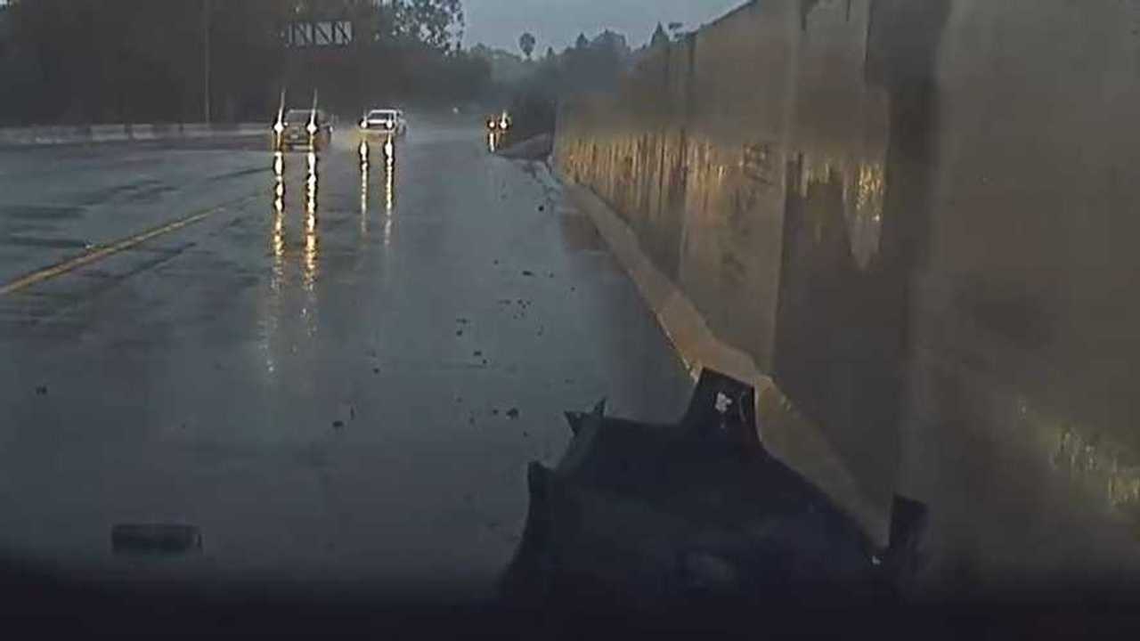 tesla model 3 crash rain