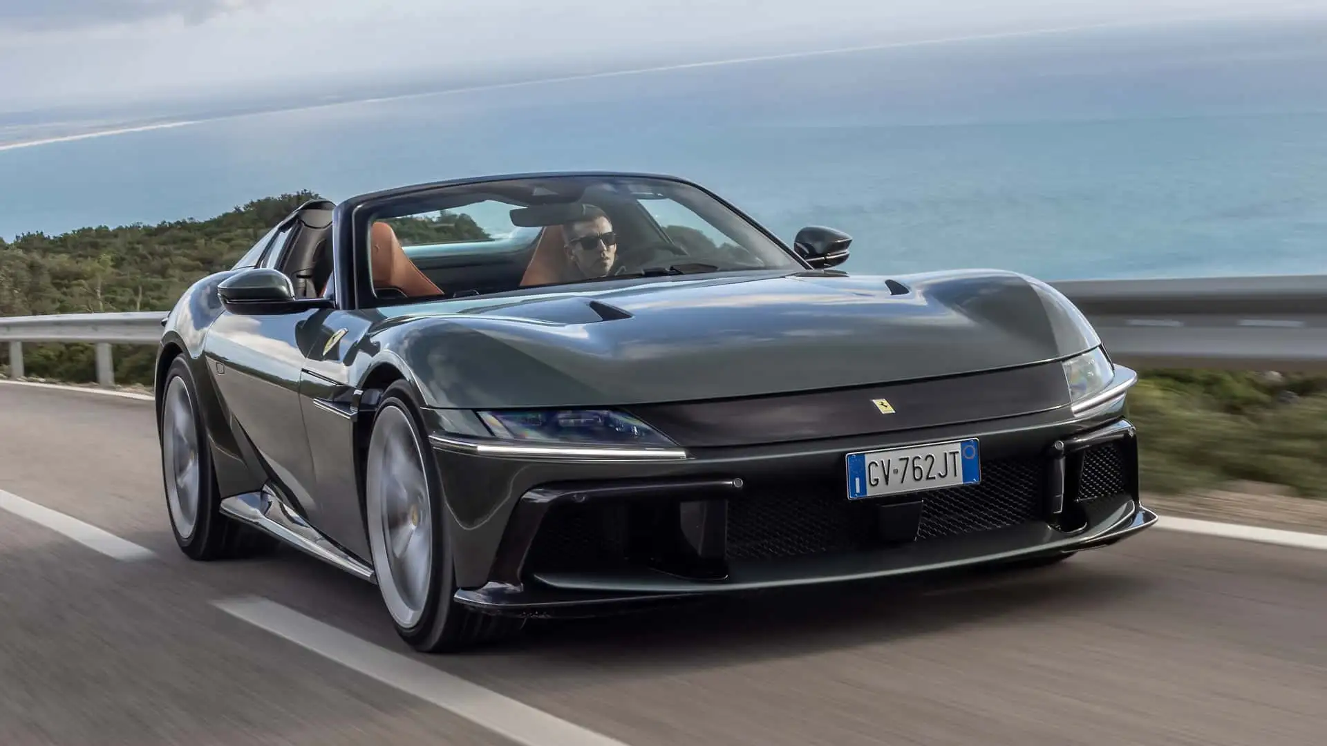 https://cdn.motor1.com/images/mgl/2N0OOg/s1/2025-ferrari-12cilindri-spider-first-drive-review.webp