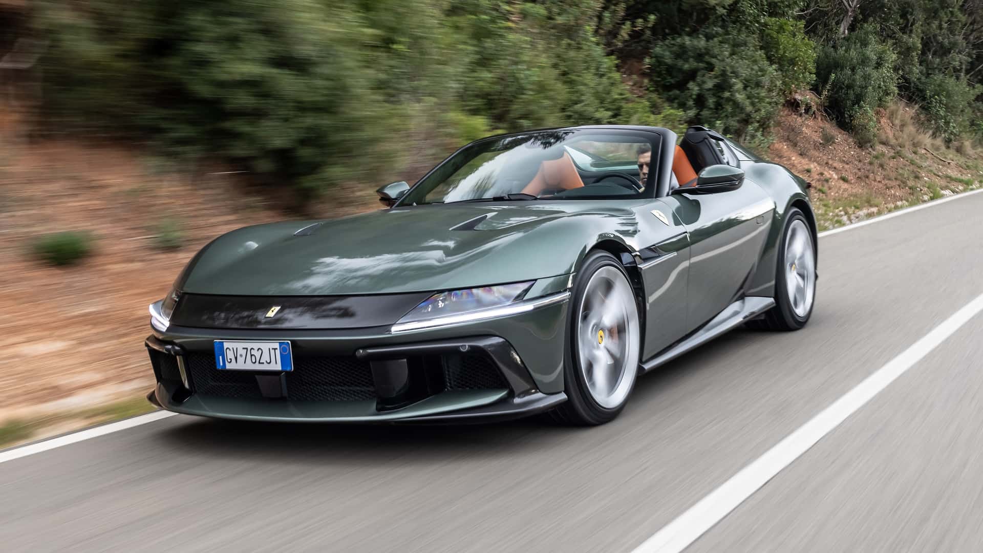 https://cdn.motor1.com/images/mgl/2N0OOx/s1/2025-ferrari-12cilindri-spider-first-drive-review.jpg