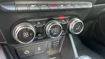 Teste Renault Duster Iconic Plus 1.3 TCe 2026 - comandos de ar-condicionado