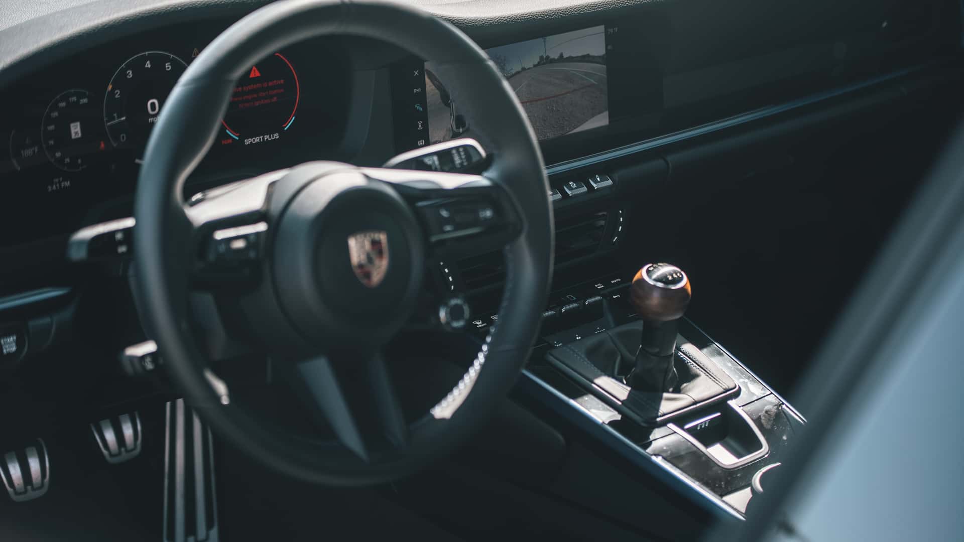 https://cdn.motor1.com/images/mgl/2N4mrx/s1/2026-porsche-911-carrera-t-review.jpg