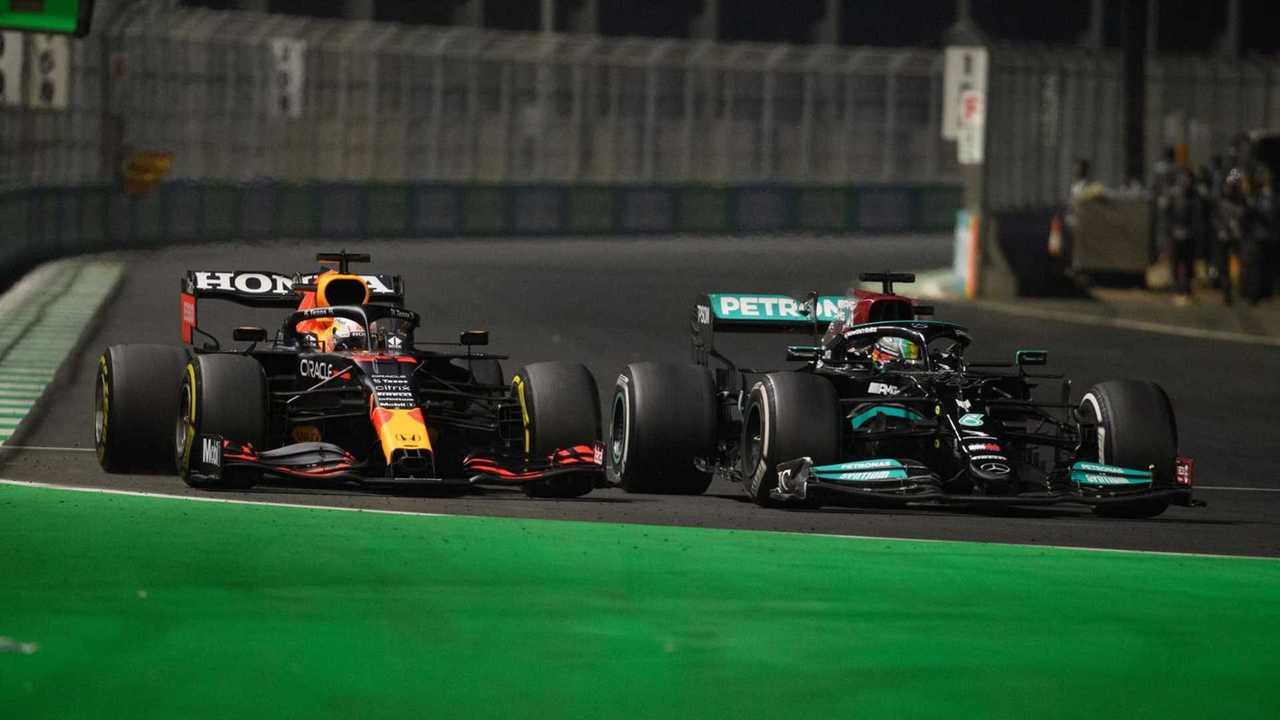 Lewis Hamilton, Mercedes W12, battles with Max Verstappen, Red Bull Racing RB16B
