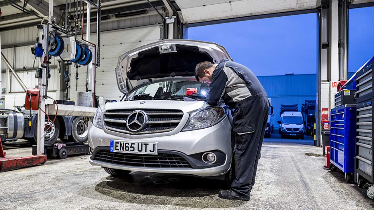 Mechanic technician working on Mercedes-Benz Citan