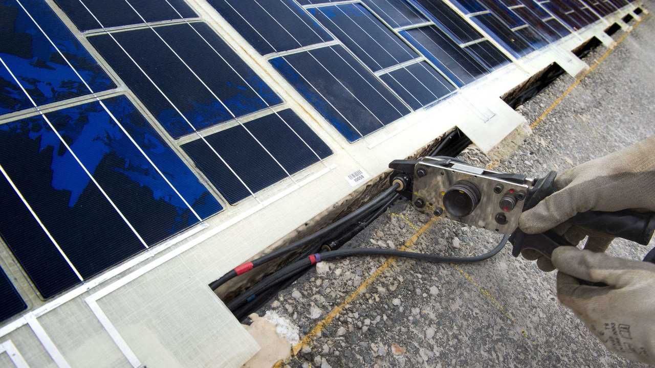 Colas solar panel road