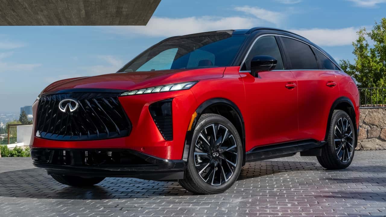 Close-up of 2027 INFINITI QX65 illuminated LED taillights with fastback profile