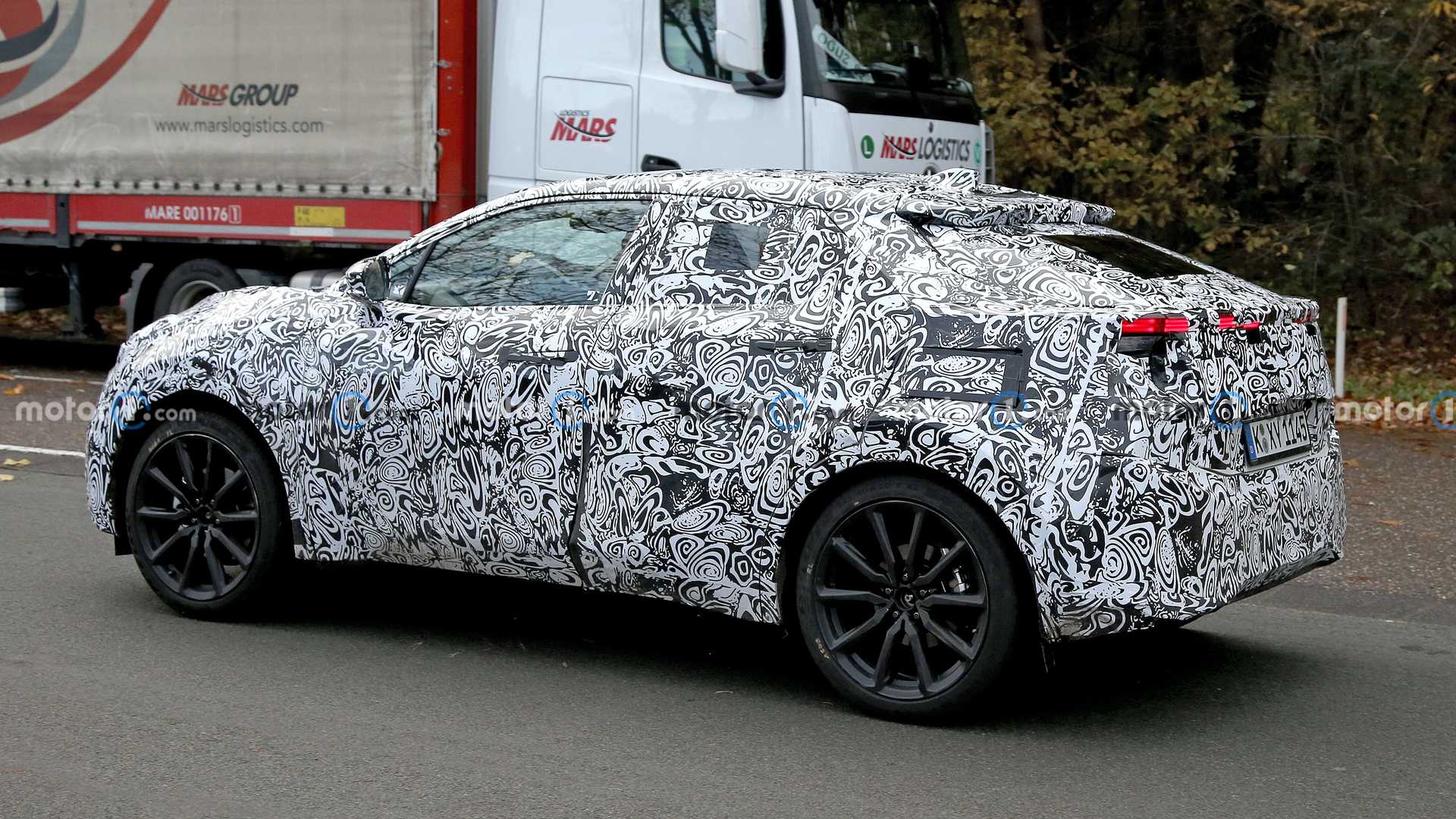 toyota-small-su-ev-side-view-spy-photo.jpg