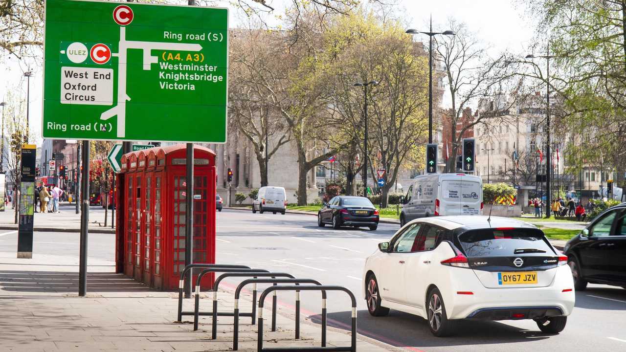 Ultra Low Emissions Zone sign with Nissan Leaf