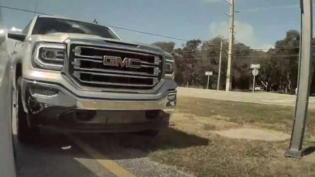 Watch This Crazy GMC Sierra Truck Driver Attack A Tesla Numerous Times