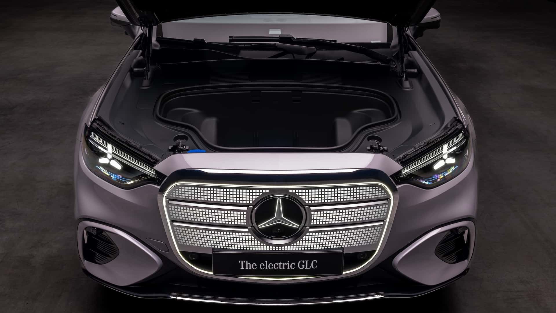 Close-up of the illuminated front grille of the 2026 Mercedes-Benz GLC EV.