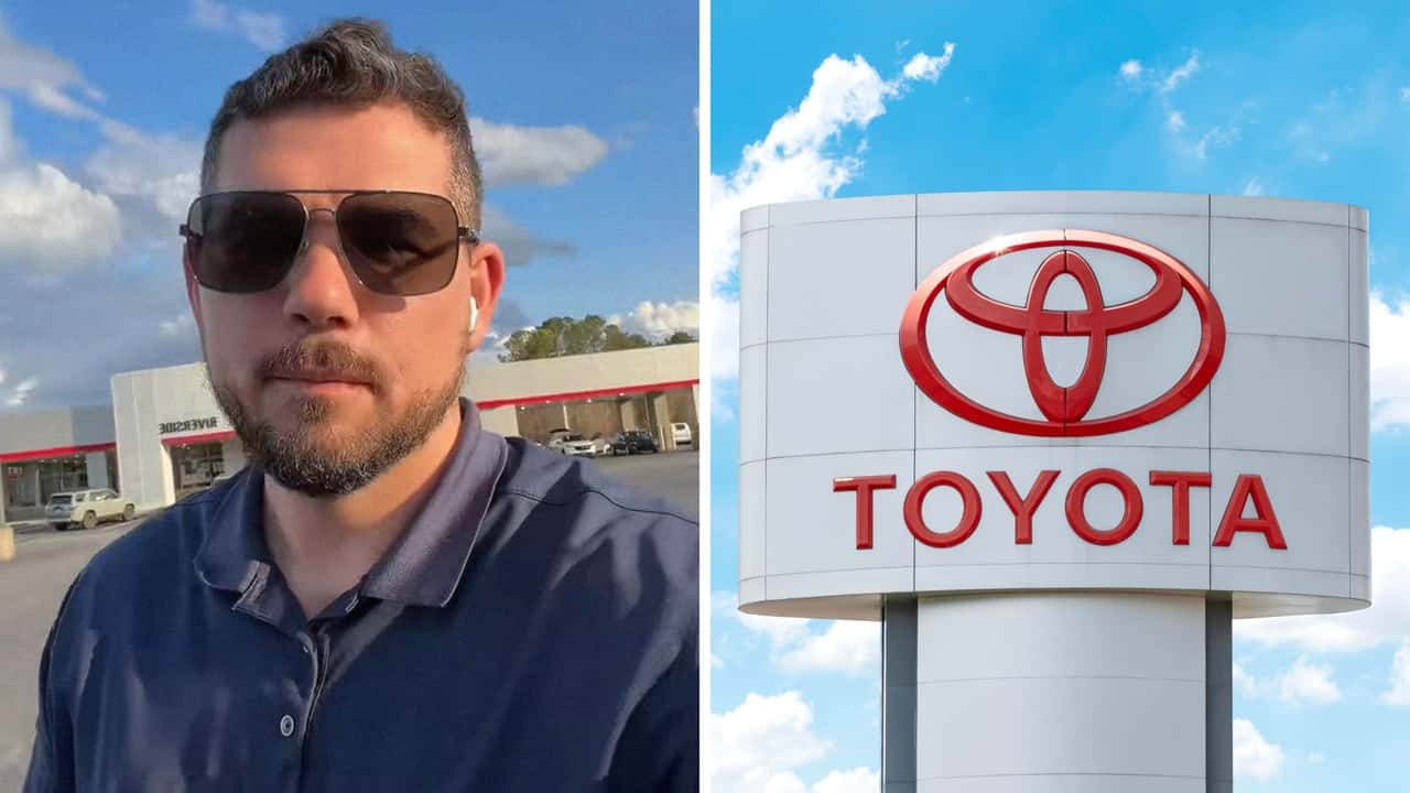  Man shops at Toyota dealership