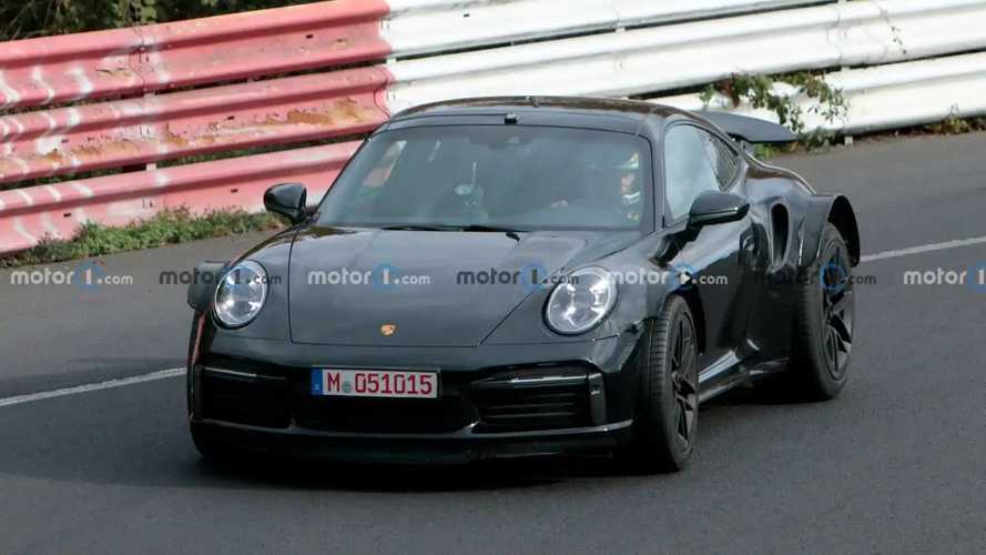 Porsche 911 Turbo test mule spied riding high and with big arches