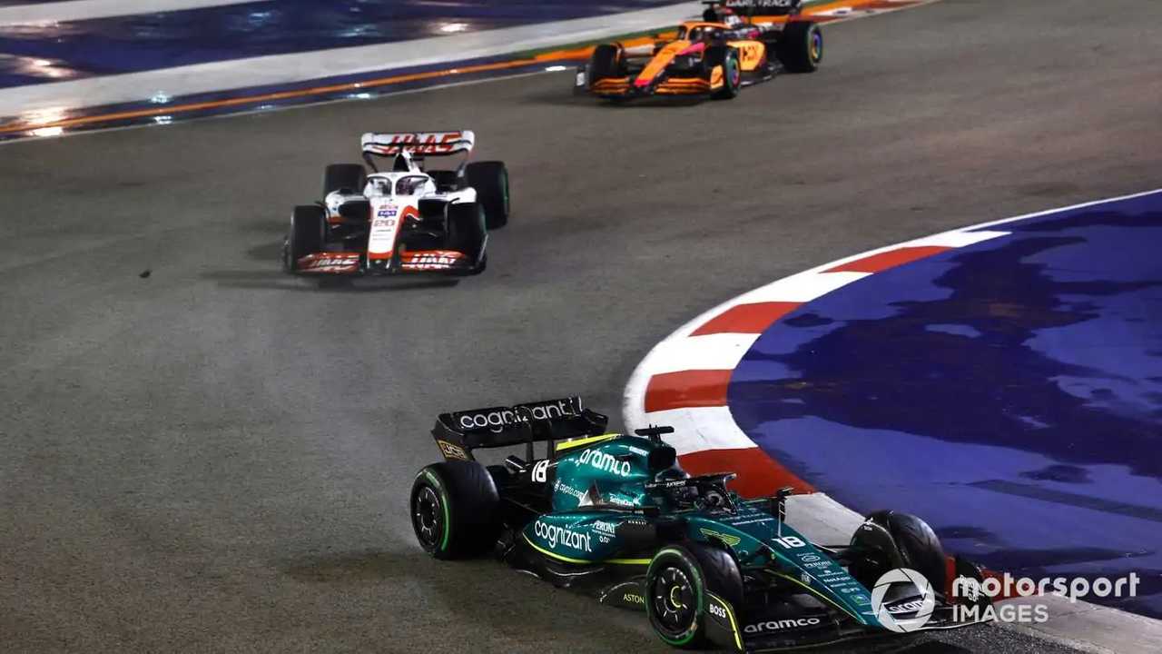 Lance Stroll, Kevin Magnussen and Lando Norris at Singapore GP 2022