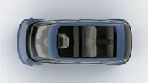 Indigo Flow ride-sharing electric vehicle exterior aerial view panoramic roof