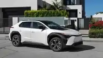 2023 Toyota bZ4X XLE FWD in Wind Chill Pearl paint front three-quarter view