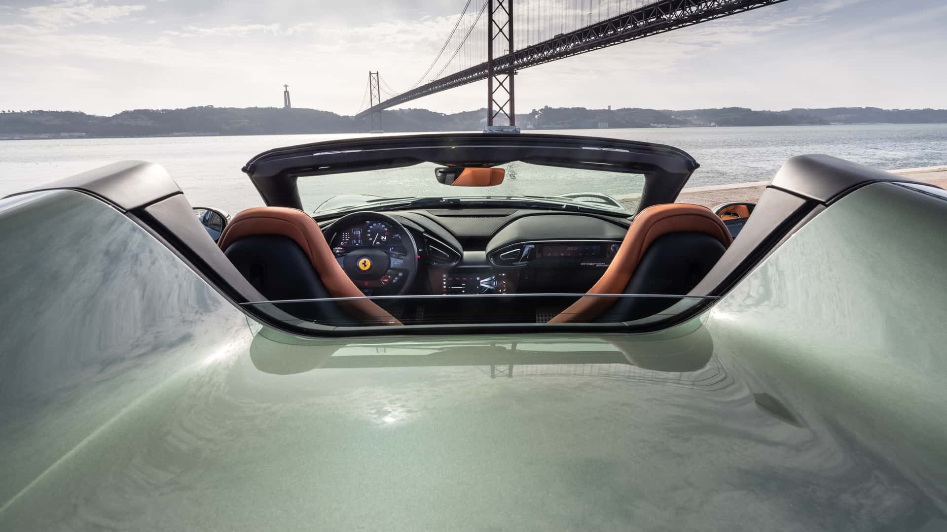 https://cdn.motor1.com/images/mgl/40xeek/s1/2025-ferrari-12cilindri-spider-first-drive-review.jpg