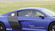 Bastian Schweinsteiger and Thomas Müller in the Audi R8