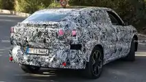 BMW iX2, le prime foto spia