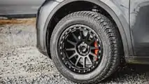 Unplugged Performance Tesla Model Y with Satin Black 18-Inch UP-03 Beadlock Wheels