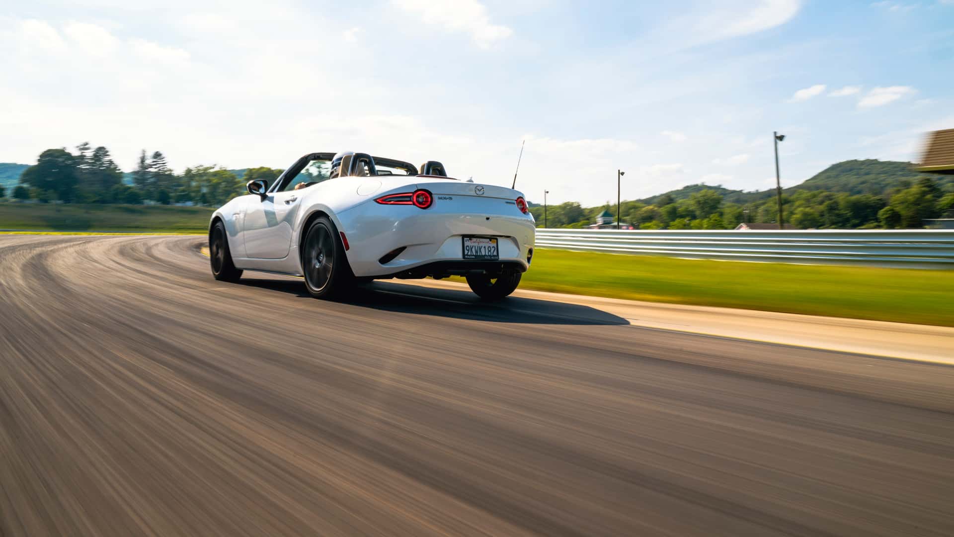 https://cdn.motor1.com/images/mgl/6ZQqKl/s1/2024-mazda-mx-5-miata-grand-touring-review.jpg