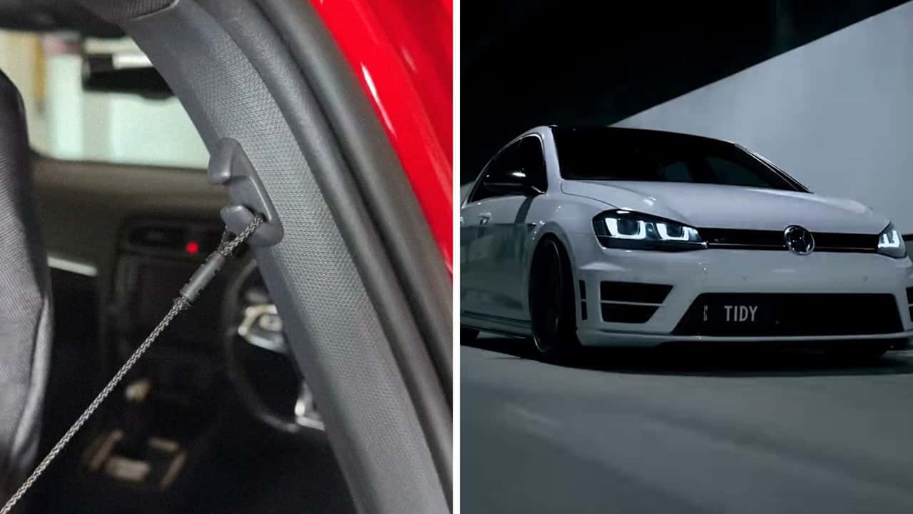 VW Golf Driver Figures Out What Seat Hooks Are For