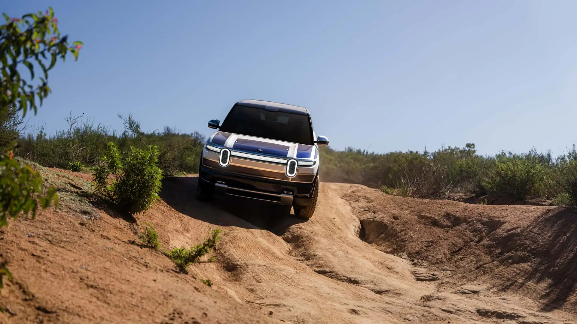 https://cdn.motor1.com/images/mgl/6ZeyV7/s1/2026-rivian-r2-prototype-drive.webp