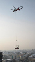 Bentley airlifts a V8 Continental GT coupe over Munich 08.02.2012