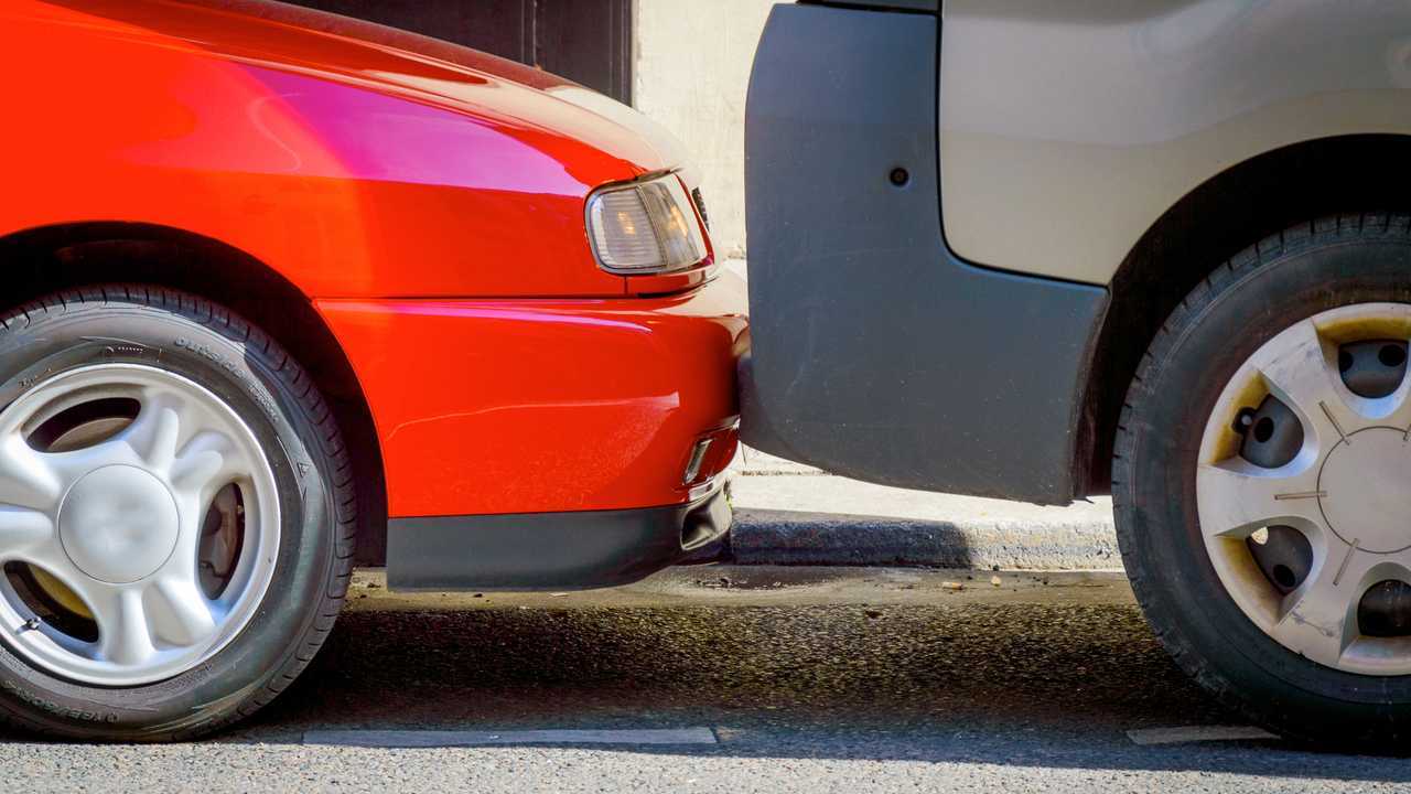 Cars parked on the street very tightly to each other