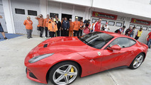 Sebastian Vettel with the Ferrari F12berlinetta