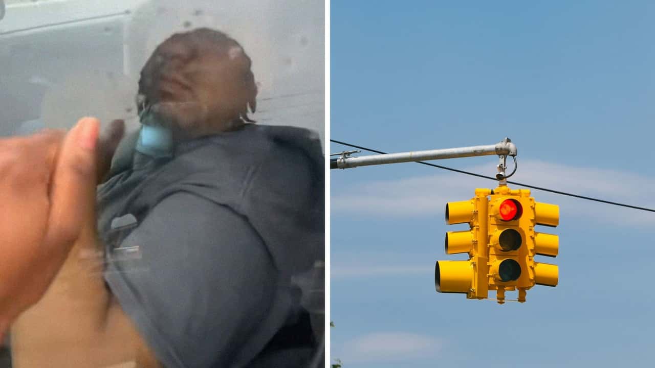 Driver notices Honda driver in front of them at stoplight. Then they get out, knocks on his window
