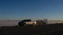Our trip's savior, my 100,000-mile Honda Ridgeline overlooking the salt flats.