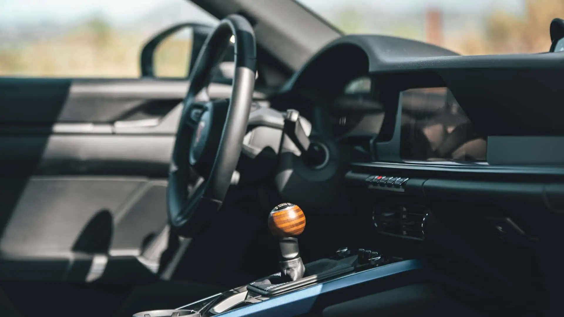 https://cdn.motor1.com/images/mgl/7ZEgrA/s1/2026-porsche-911-carrera-t-review.webp