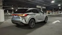 Lexus RX450h+ PHEV rear three quarter 2